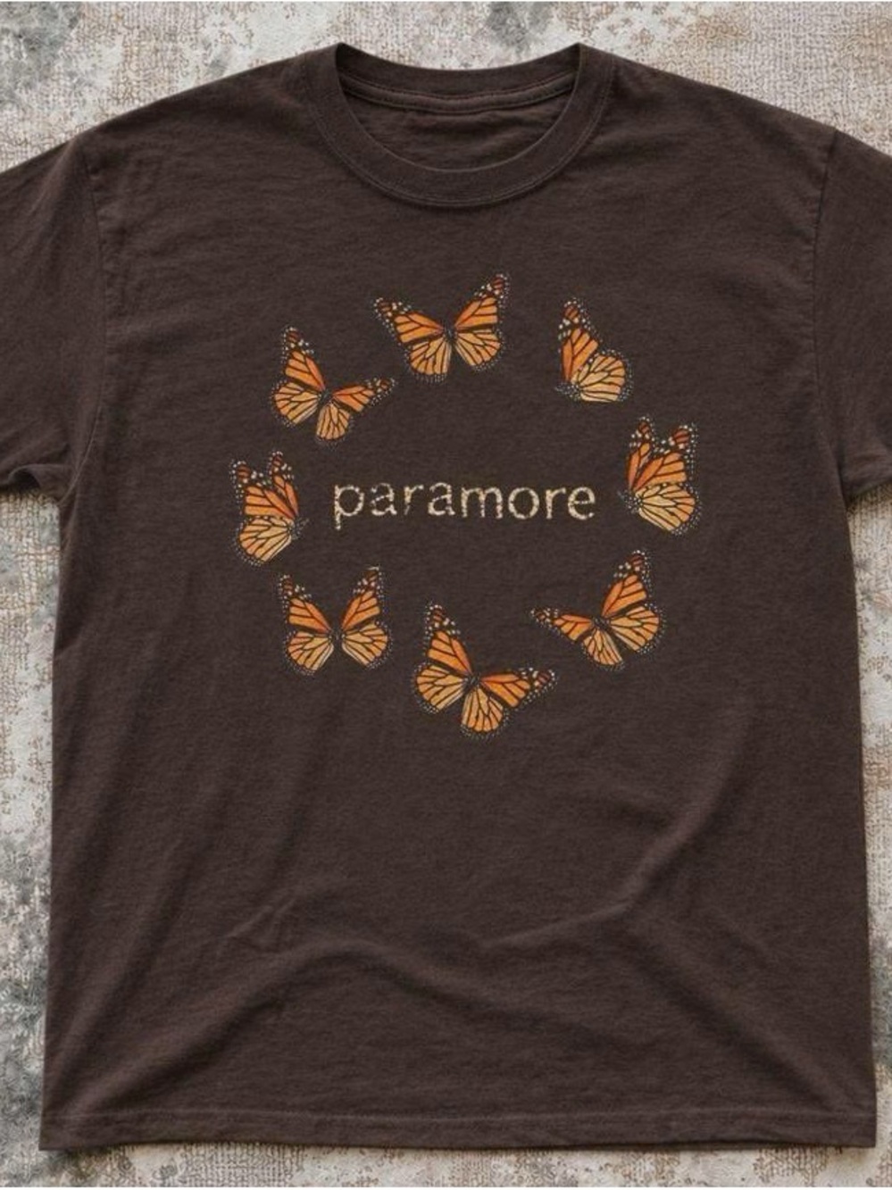 Brown Tee with Orange Butterfly Circle and 'paramore' Text